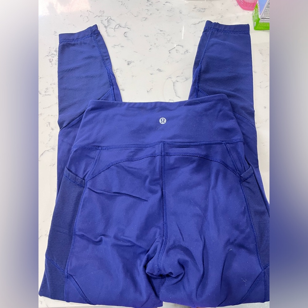 Blue lululemon leggings with mesh sides